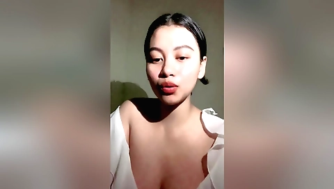 Indian chick 18+ is showing her tits while naked in the room
