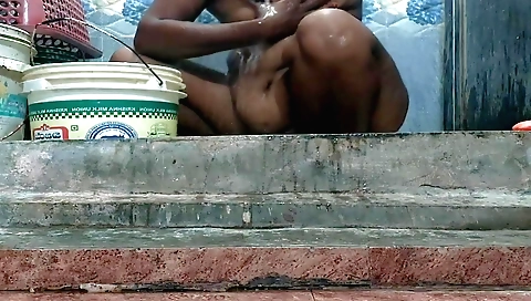 Indian petite brunette gets her pussy wet and naked in shower