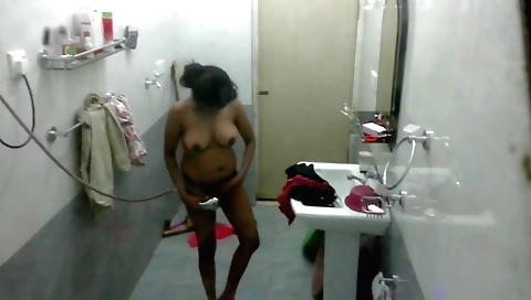 Hot milf with big tits and natural boobs gets showered in the bathroom