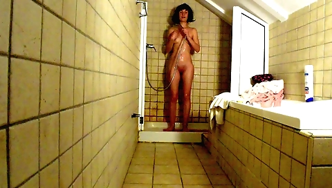 Indian girl is massaging her pussy while showering