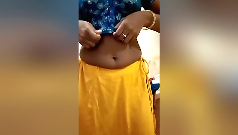 Indian milf 18+ in a sexy bra and saree in a bedroom
