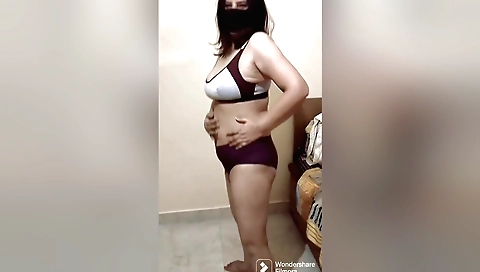 Indian brunette milf with a sexy ass is dancing with her vibrator