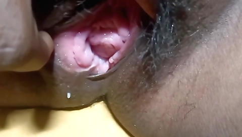 Hairy naked female masturbates with a huge vibrator