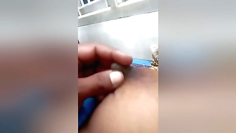 Indian slut in a sexy white dress takes a bath in the bedroom