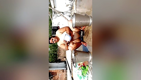 Big-titted woman in the backyard getting fucked outdoors