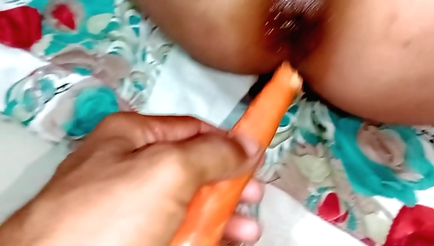 A woman is double penetrated by a big penis and a big toy