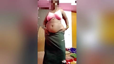 Busty indian chick naked in a white blouse and black dress