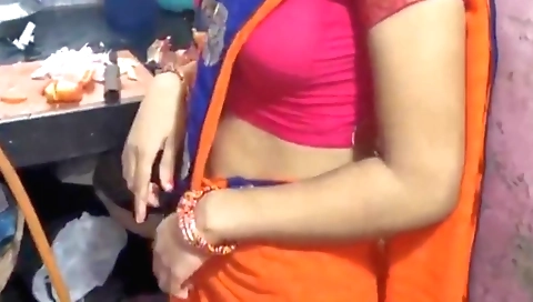 Amateur brunette cooking a hot bhabhi in a kitchen