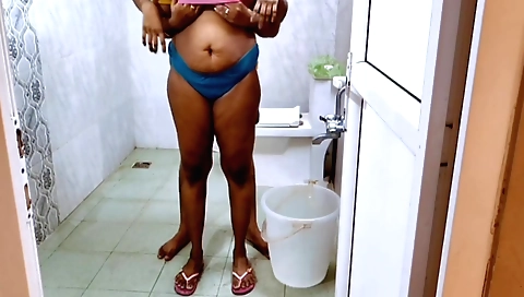 Milf with a large ass gets pussy fucked in the bathroom