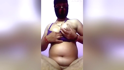 Indian woman with hairy pussy masturbates in a solo video