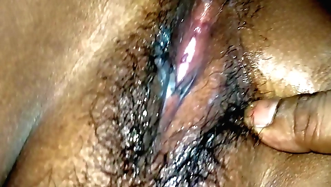 Indian teen girl shows off her hairy pussy in front of the camera